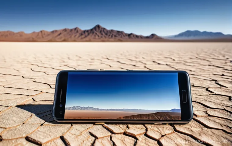 기계공학 열적시험 - **Smartphone in Extreme Desert Heat:** A hyperrealistic, wide-angle shot of a sleek, modern smartpho...